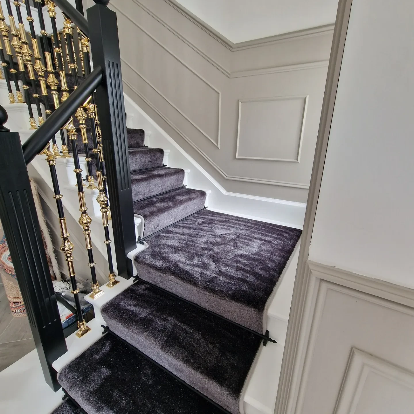 Dark velvet carpet with gold railings